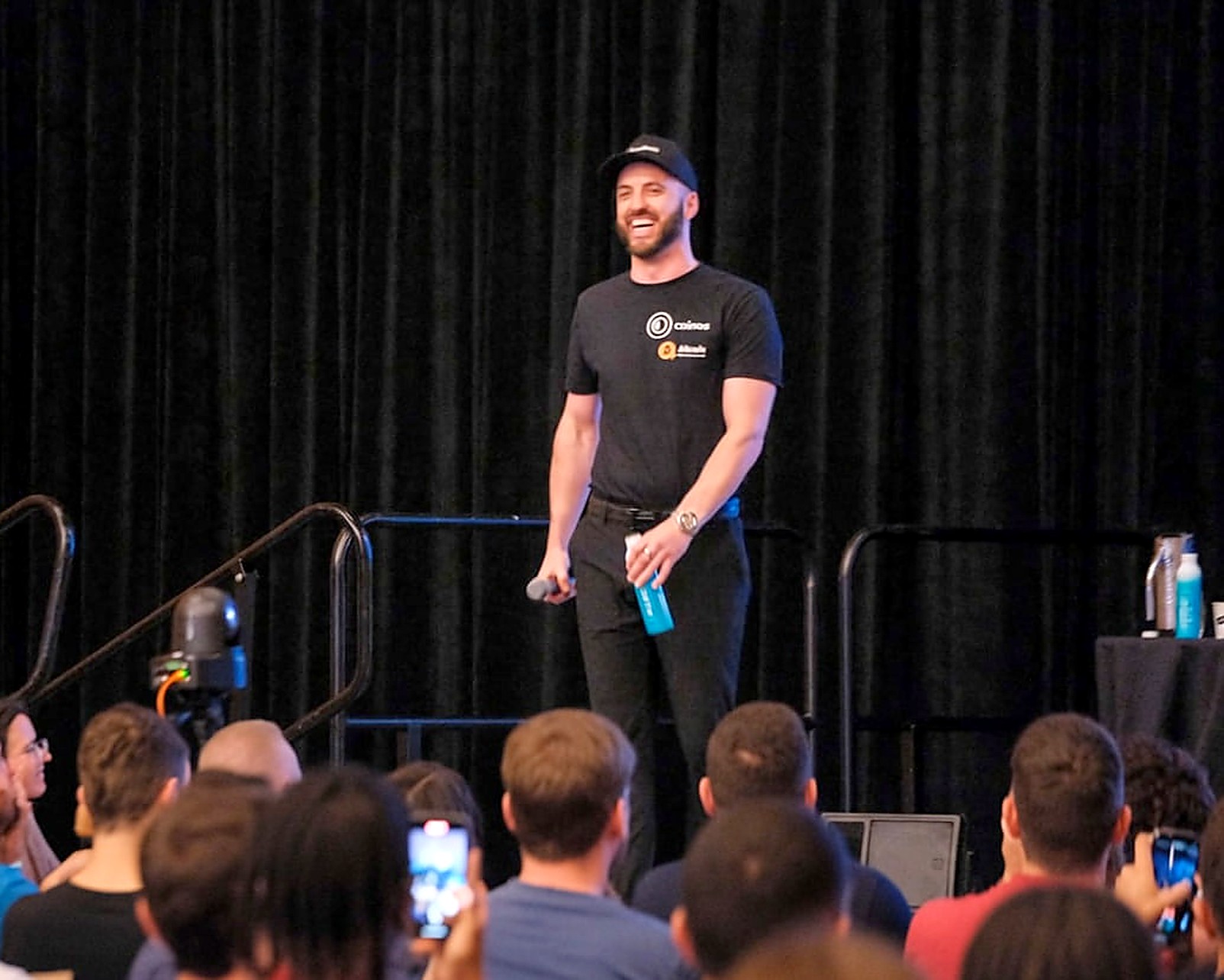 Cole Goodwin speaking on stage